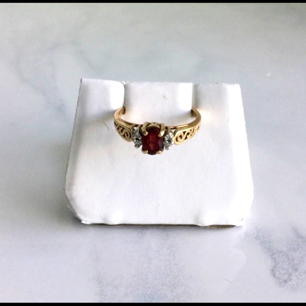 Oval Shaped Garnet and Diamonds